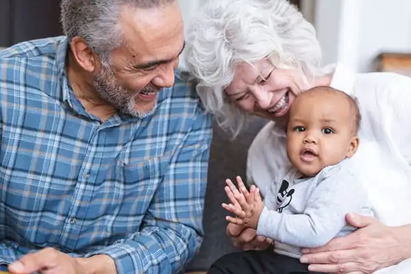 Grandparents with child, clients in electronic health records software