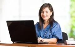 woman seated at laptop